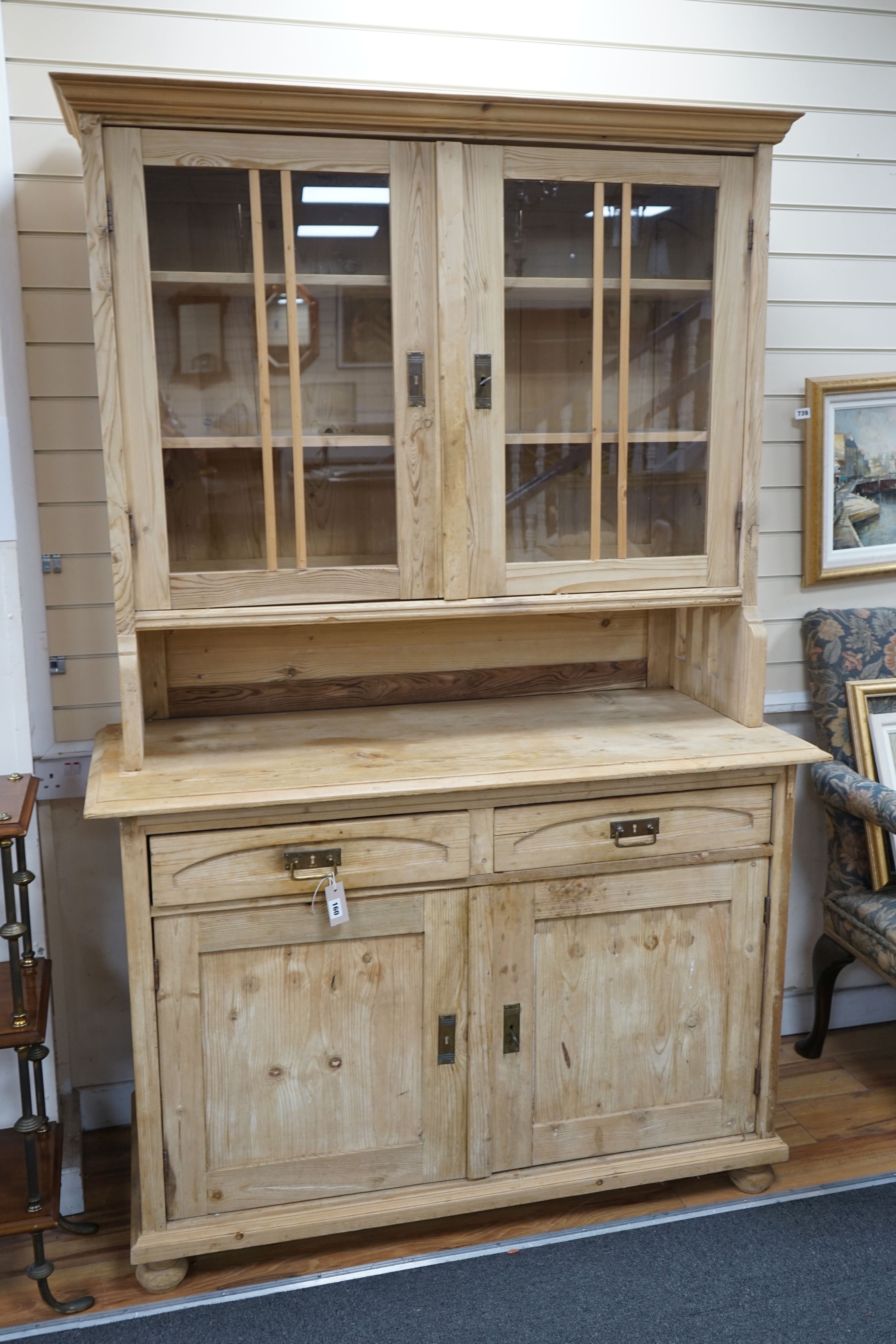 A 19th century east European pine dresser, width 130cm, depth 58cm, height 202cm